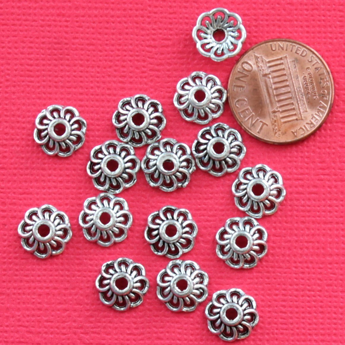 Capuchons de perles de ton argent antique - 10 mm x 4 mm - 20 pièces - FD259