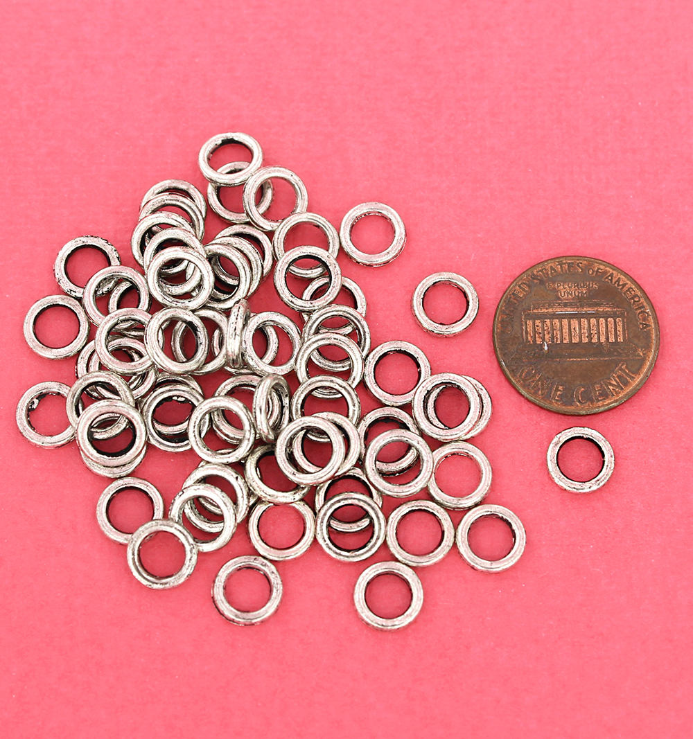 Anneaux argentés antiques 8 mm x 1,6 mm - Calibre 14 fermé - 50 anneaux - J089