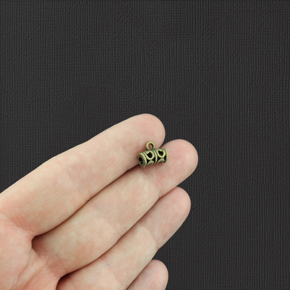 Perles de caution 11,5 mm x 9 mm - ton bronze antique - 12 perles - BC031