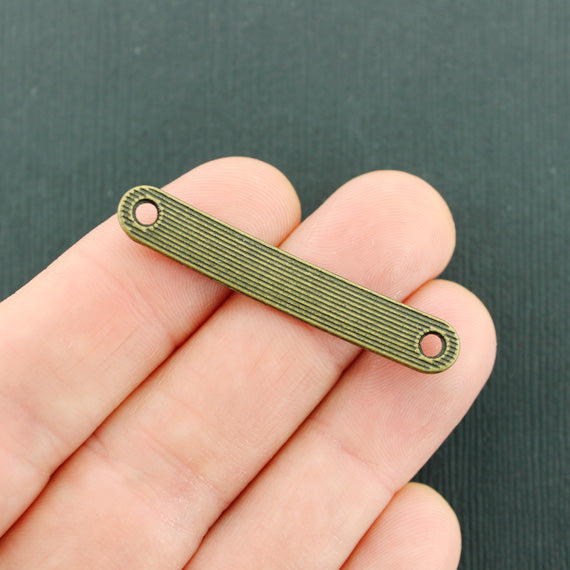 Curved Connector Stamping Blanks - Bronze Tone - 44.5mm x 7mm - 10 Tags - Z976