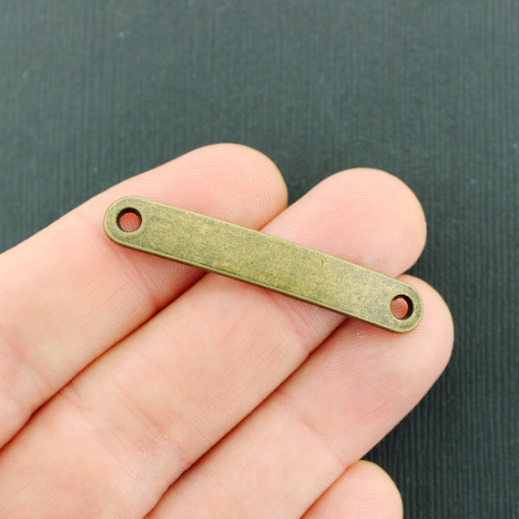 Curved Connector Stamping Blanks - Bronze Tone - 44.5mm x 7mm - 10 Tags - Z976
