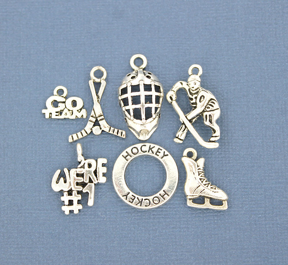 Collection de breloques de hockey ton argent antique 7 breloques différentes - COL069