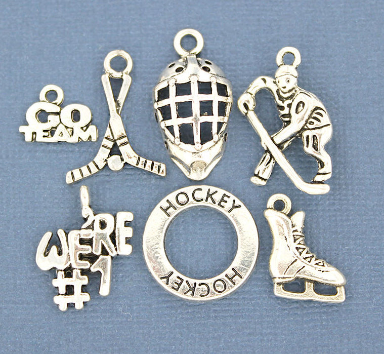 Collection de breloques de hockey ton argent antique 7 breloques différentes - COL069