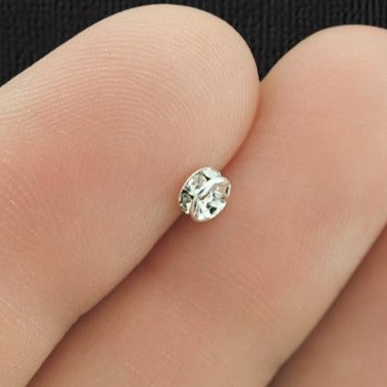 Perles d'espacement Rondelle 4 mm x 2,1 mm - ton argent avec strass clairs incrustés - 25 perles - SC6052