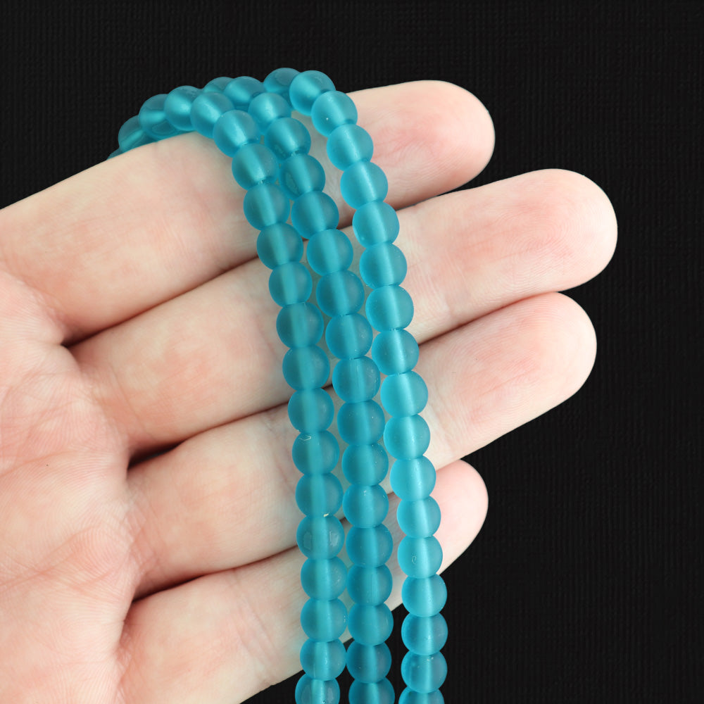 Perles rondes en verre de mer de culture 6 mm - Bleu sarcelle - 1 rang 32 perles - U235