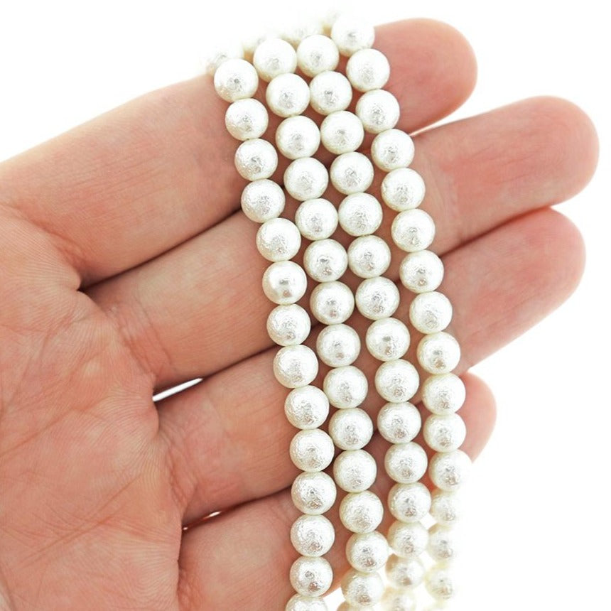 Perles rondes en coquillage naturel 6 mm - Blanc ridé - 1 rang 34 perles - BD1437