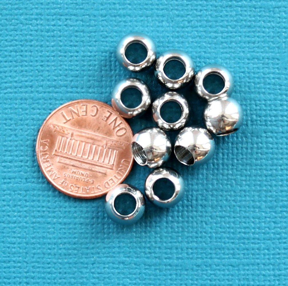 Perles d'espacement rondes en acier inoxydable 5,5 mm x 8 mm - ton argent - 10 perles - FD244