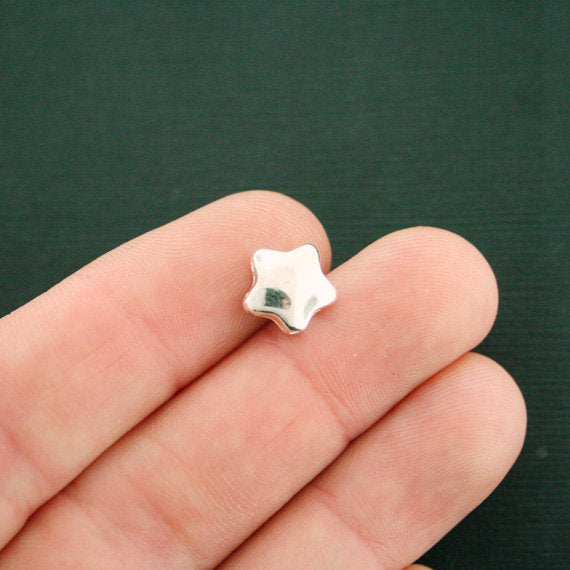 Perles d'espacement étoile 10 mm x 3 mm - ton argent - 12 perles - SC7542