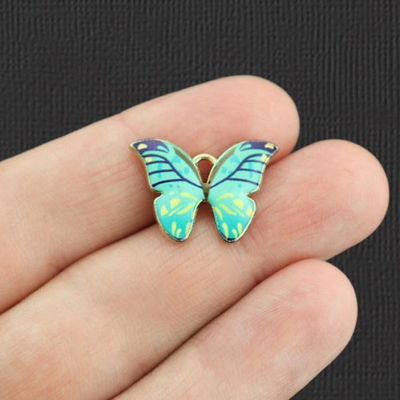 5 breloques en émail doré papillon violet - E1079