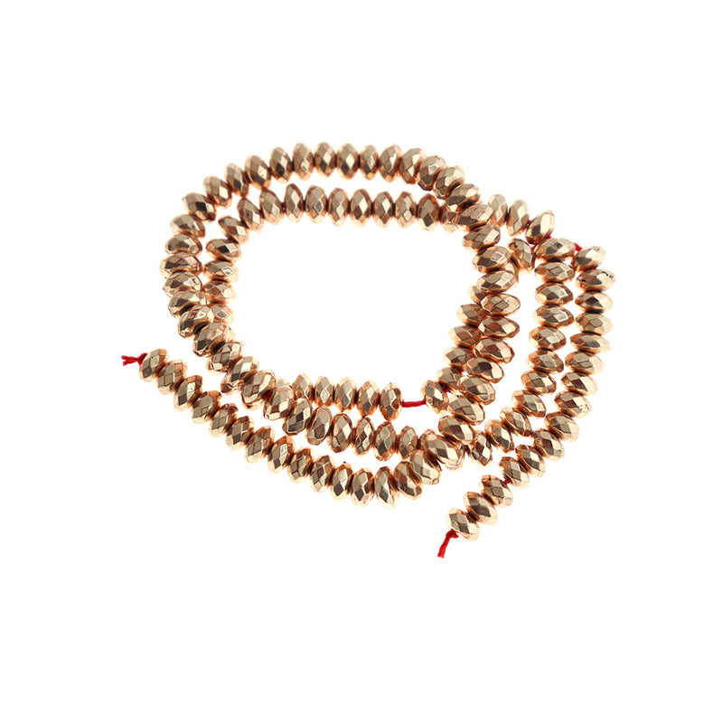 Faceted Rondelle Synthetic Hematite Beads 5.5mm x 3mm - Electroplated Rose Gold - 1 Strand 131 Beads - BD159