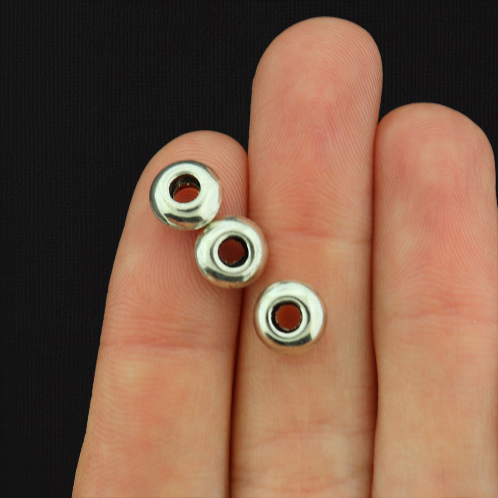 Perles d'espacement rondes plates 8 mm x 4 mm - ton argent antique - 50 perles - SC3548