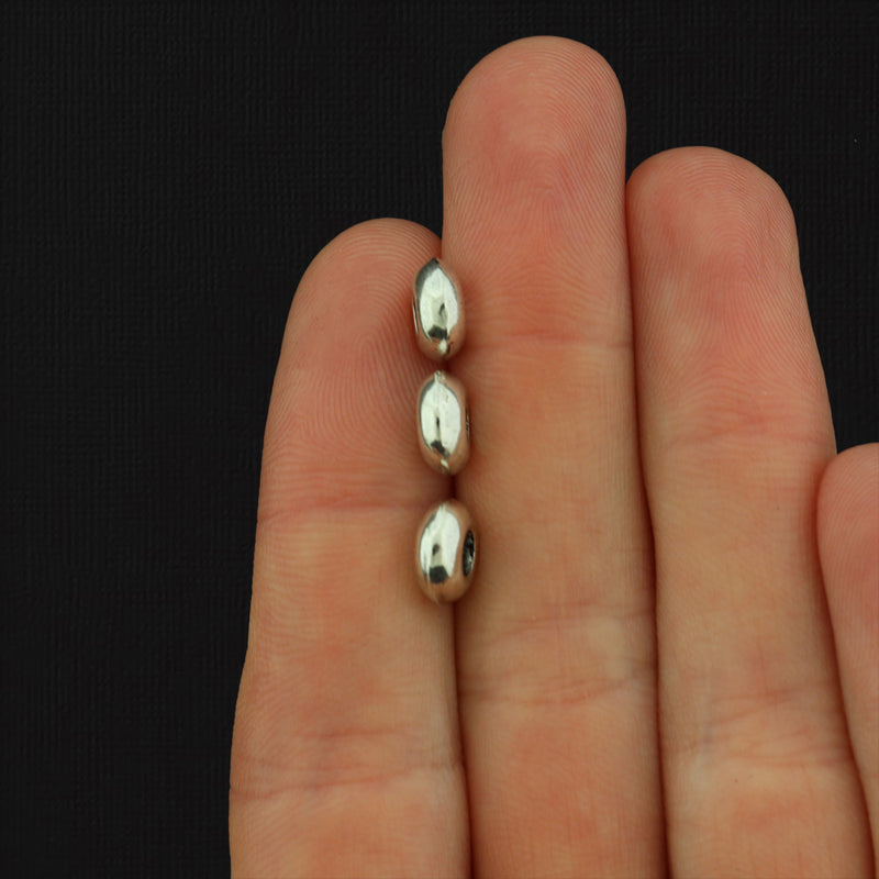 Perles d'espacement rondes plates 8 mm x 4 mm - ton argent antique - 50 perles - SC3548