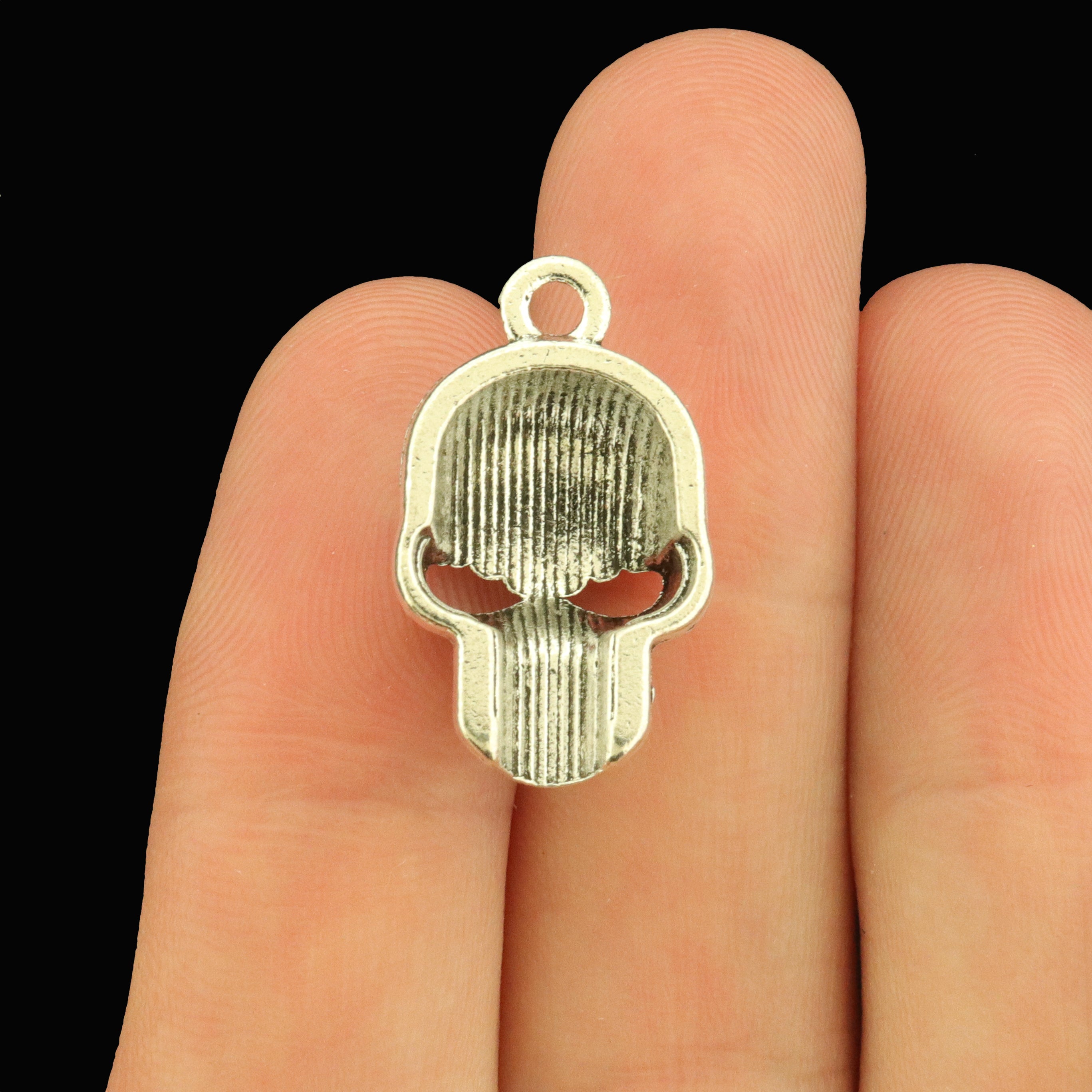 10 Fiery Smiling Skull Antique Silver Tone Charms - SC583