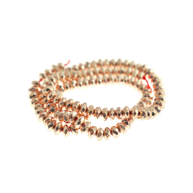 Faceted Rondelle Synthetic Hematite Beads 5.5mm x 3mm - Electroplated Rose Gold - 1 Strand 131 Beads - BD159