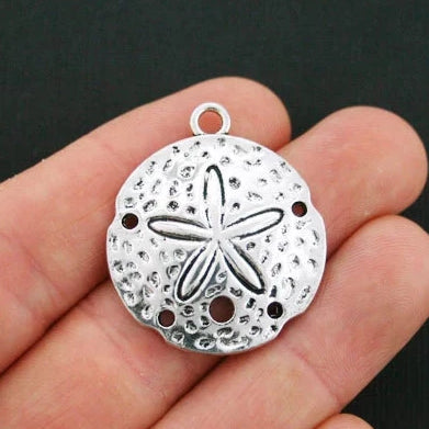 4 Sand Dollar Antique Silver Tone Charms - SC104