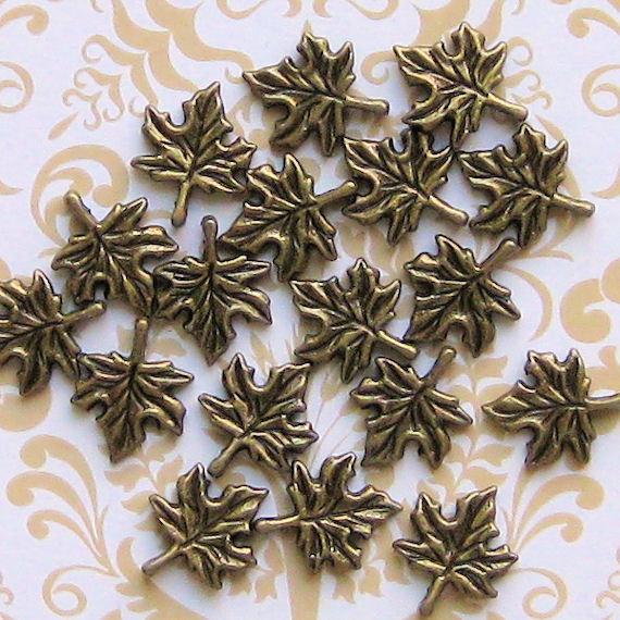 10 Maple Leaf Antique Bronze Tone Charms - BC220