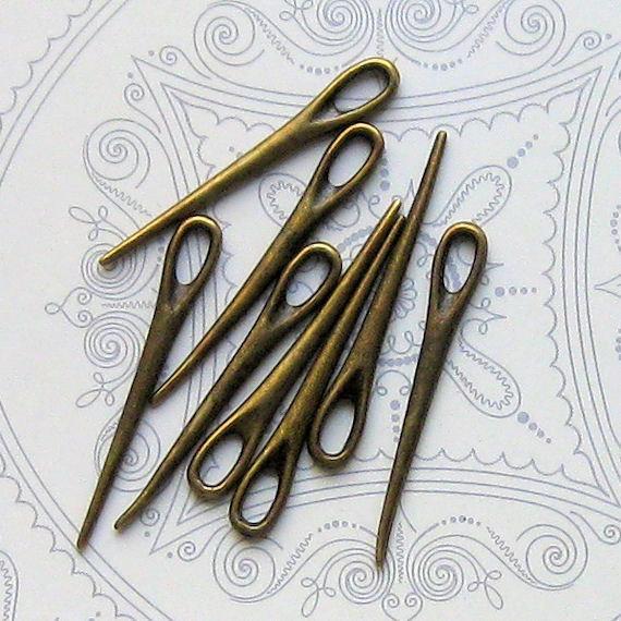 10 Needle Antique Bronze Tone Charms 3D - BC087