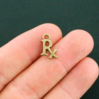10 RX Antique Bronze Tone Charms - BC935