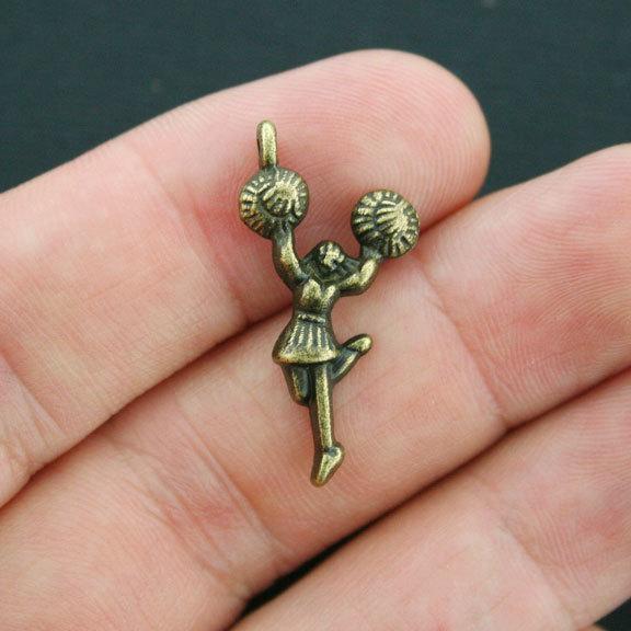 10 breloques de ton bronze antique de pom-pom girl - BC1086