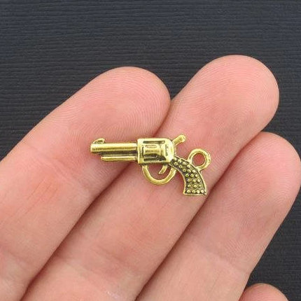 10 Gun Antique Gold Tone Charms 2 faces - GC253