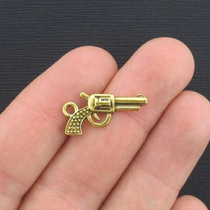 10 Gun Antique Gold Tone Charms 2 Sided - GC253