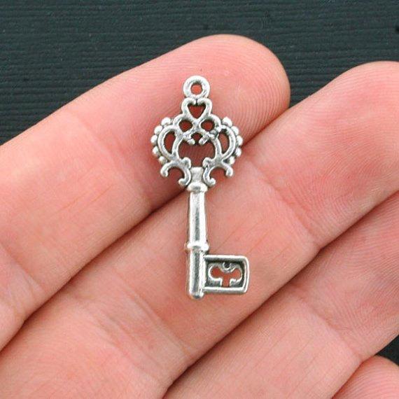 10 Key Antique Silver Tone Charms 2 Sided - SC3251