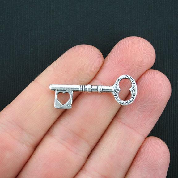 10 Key Antique Silver Tone Charms 2 Sided - SC3507