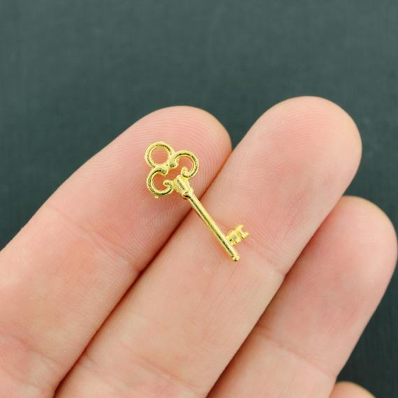 10 Key Gold Tone Charms 2 Sided - GC1278