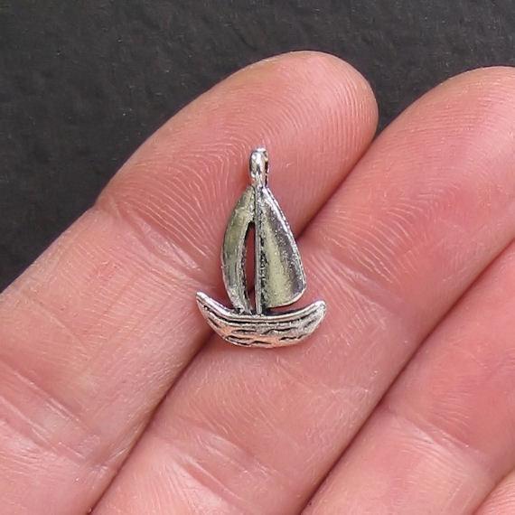 10 Sailboat Antique Silver Tone Charms - SC444