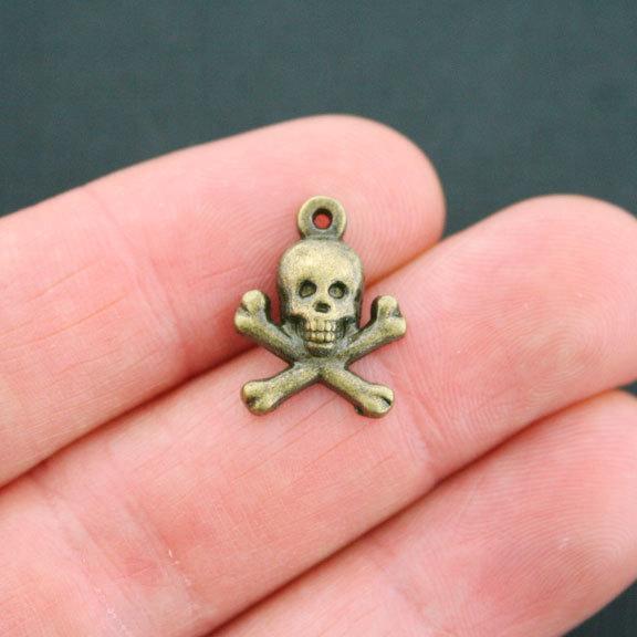 10 Skull and Cross Bones Antique Bronze Tone Charms - BC1217