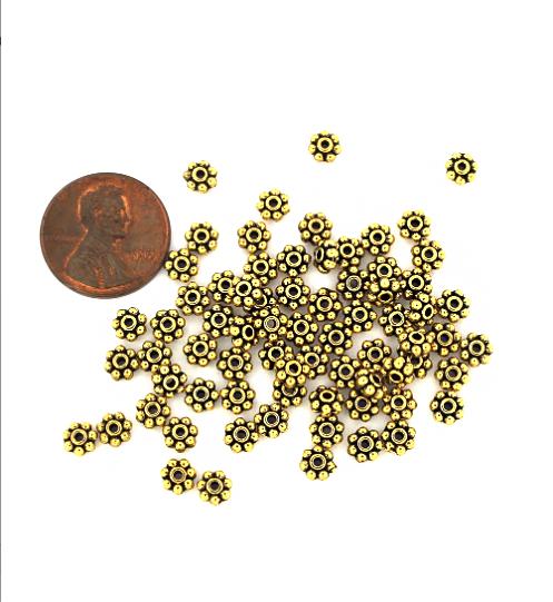 Perles intercalaires marguerite 5 mm x 1,5 mm - ton or antique - 100 perles - GC1259