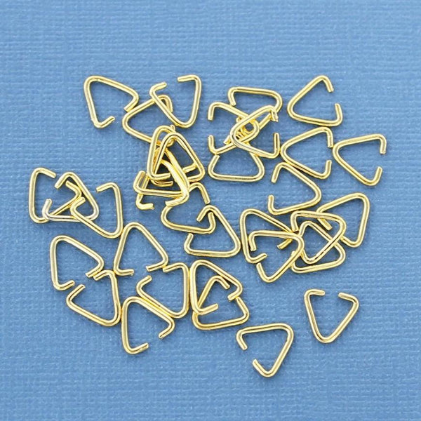 Triangle Gold Tone Jump Rings - 9mm x 6mm - Open 21 Gauge - 100 Rings - Z595
