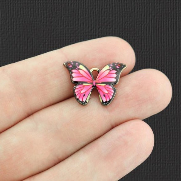 5 Pink Butterfly Gold Tone Enamel Charms - E1080