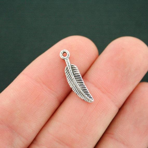 12 breloques plumes argentées antiques 2 faces - SC2836