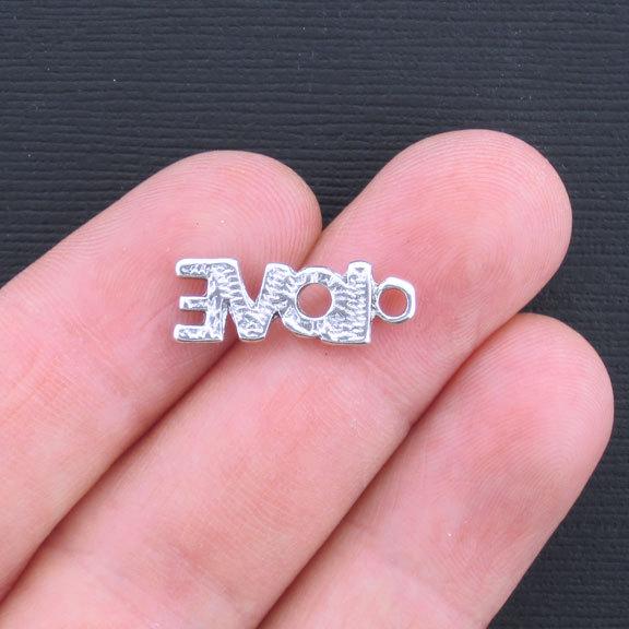 12 breloques argentées antiques d'amour - SC1150