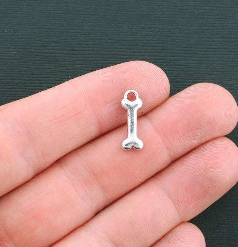 12 Bone Antique Silver Tone Charms - SC179