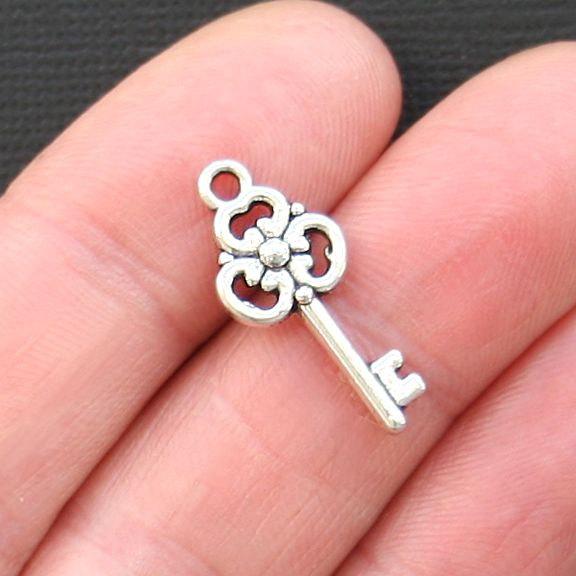 12 Key Antique Silver Tone Charms 2 Sided - SC3262