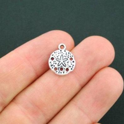 12 Sand Dollar Antique Silver Tone Charms - SC5615