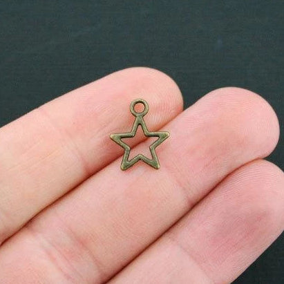 12 Star Antique Bronze Tone Charms 2 Sided - BC599