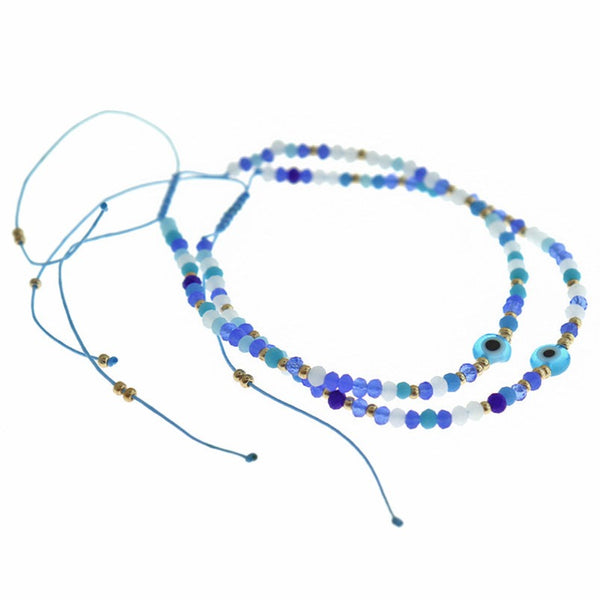 Base de bracelet de connecteur réglable en cordon de nylon bleu clair avec mauvais œil 3-7,5 "- 4 mm - 1 bracelet - N809