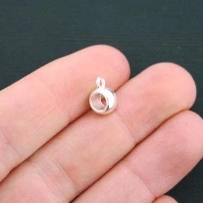 Perles de bélière rondes plates 11 mm x 7 mm - ton argent - 15 perles - SC1151