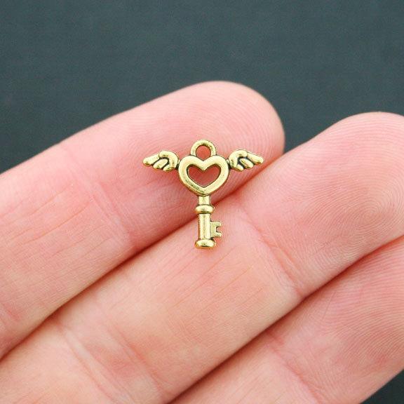 15 Key Antique Gold Tone Charms 2 Sided - GC613