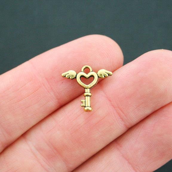15 Key Antique Gold Tone Charms 2 Sided - GC613