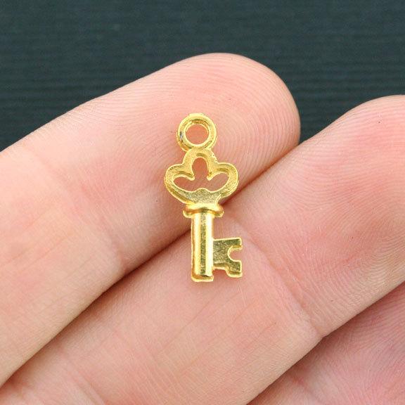 15 Key Gold Tone Charms 2 Sided - GC418