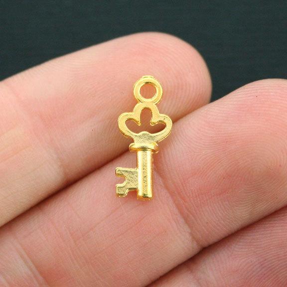 15 Key Gold Tone Charms 2 Sided - GC418