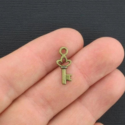 SALE 16 Key Antique Bronze Tone Charms 2 Sided - BC096