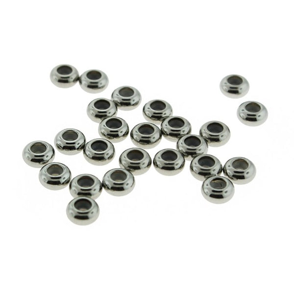 Perles rondes d'arrêt en caoutchouc en acier inoxydable 6 mm x 6 mm - ton argent - 4 perles - FD823