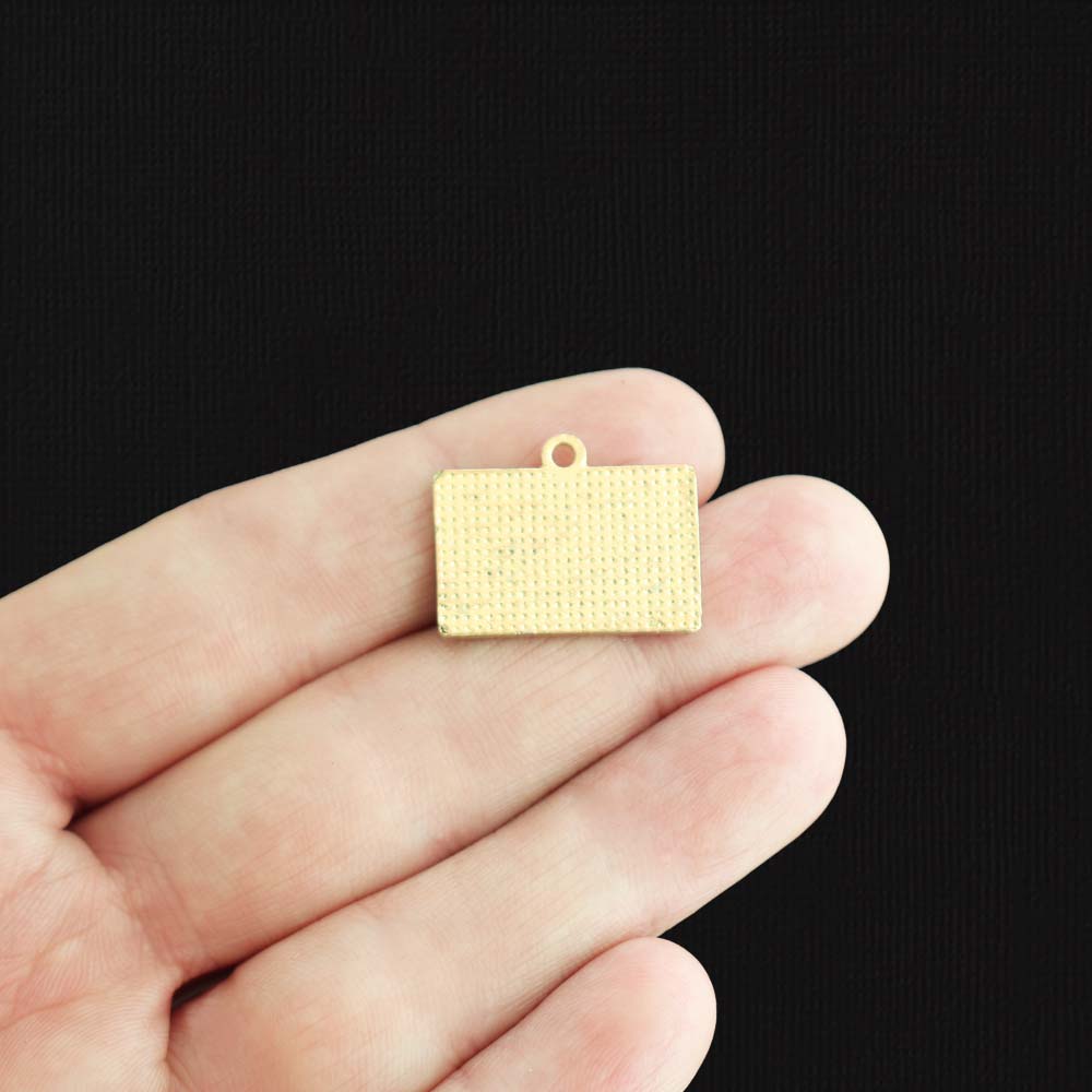 2 breloques en émail doré à cassette - E1508