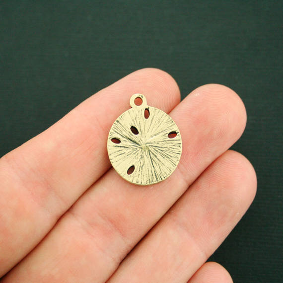 2 breloques en émail doré dollar des sables - E127