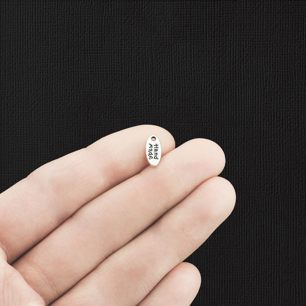 20 Hand Made Antique Silver Tone Charms - SC5557